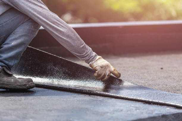 Professional Emergency Waterproofing technician working in Burlington, WI